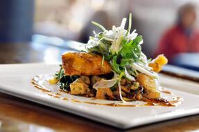 Enjoy fresh Louisiana seafood at Cotton.